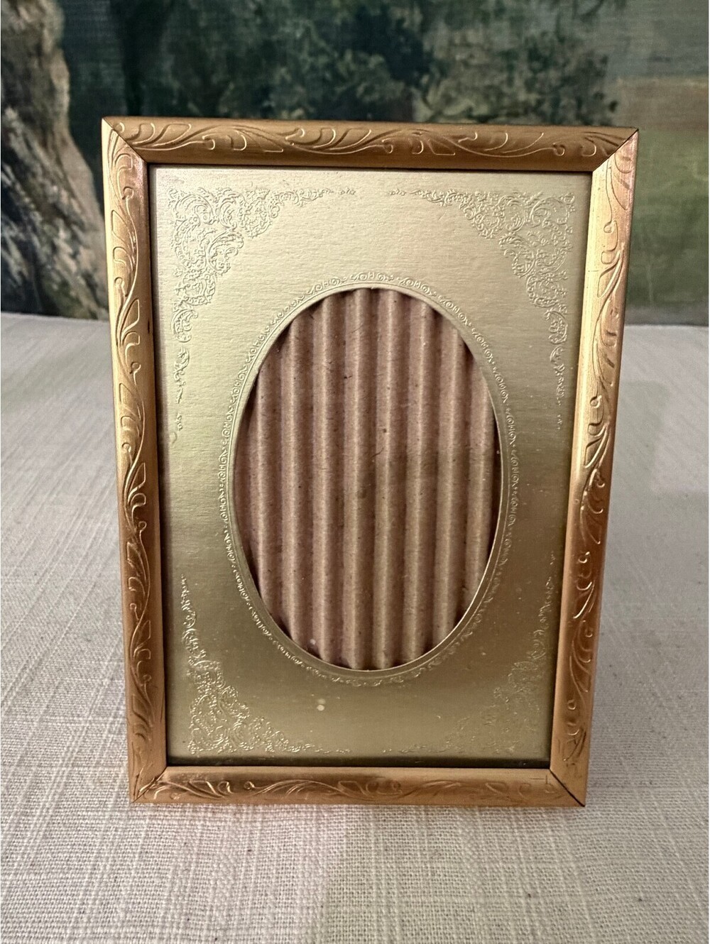 Embossed gold rectangular picture frame